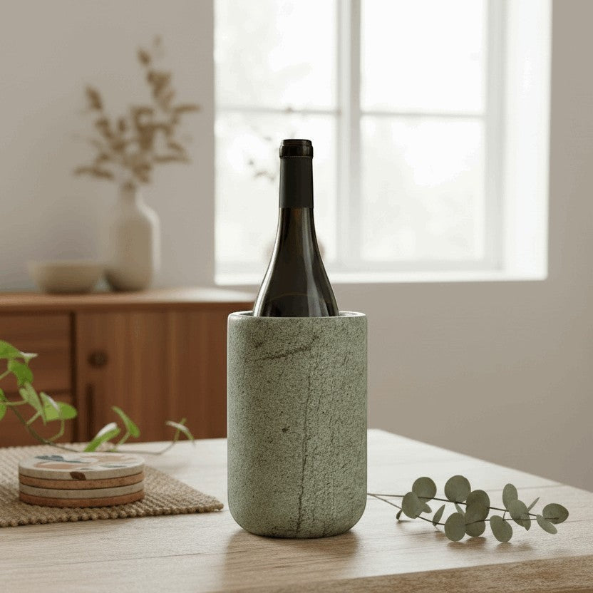 Kayu Living green onyx stone wine cooler and vase with unique veining, perfect for chilling wine or displaying flowers.