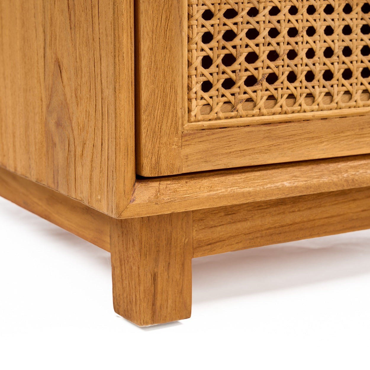 Kayu Living Harmony nightstand featuring natural solid teak wood and handwoven rattan drawer detail.
