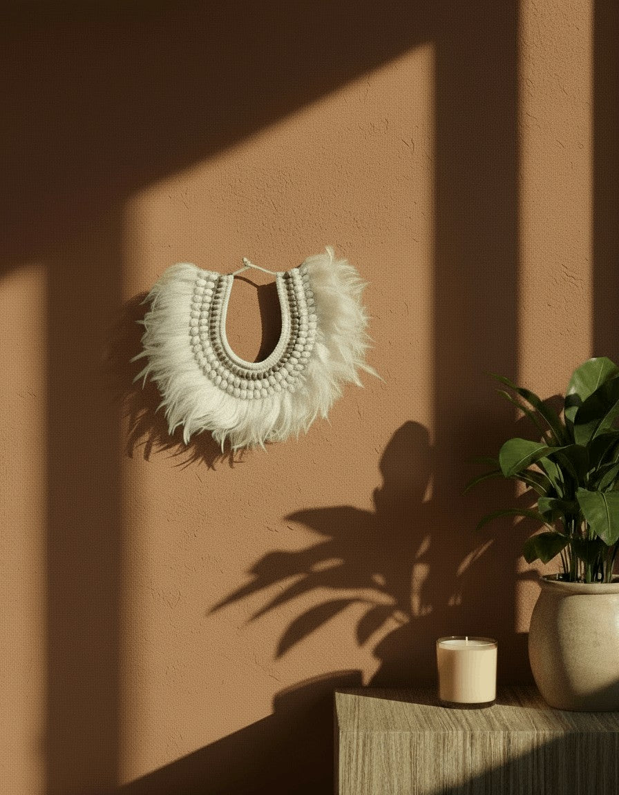 Kayu Living Ivory white feather necklace with beaded detail, handcrafted in Bali. Bohemian wall decor.
