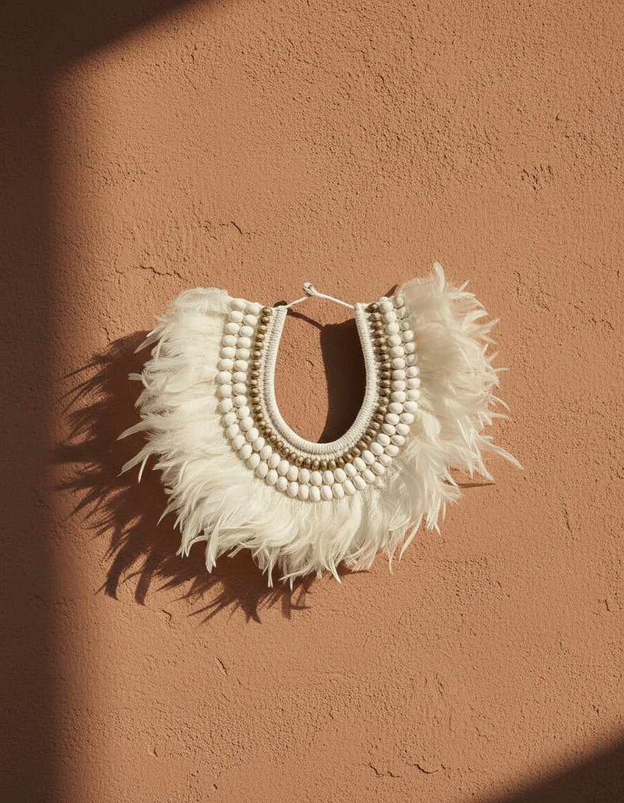 Kayu Living ivory white feather necklace with natural shells and beads, bohemian wall decor.