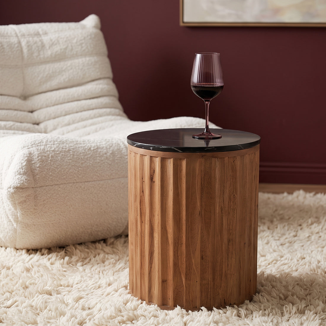 Kayu Living Langkawi side table with a round black marble top and a fluted cylindrical mango wood base