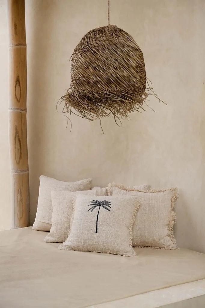 Kayu Living handwoven mendong grass pendant lamp with organic texture and natural tones, creating a cozy vibe.