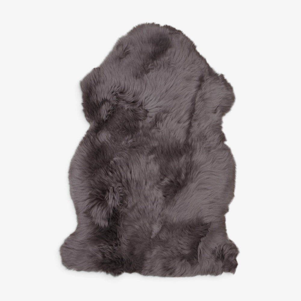 Kayu Living genuine mushroom brown lambskin rug, 50x85 cm, featuring soft, luxurious natural wool texture.