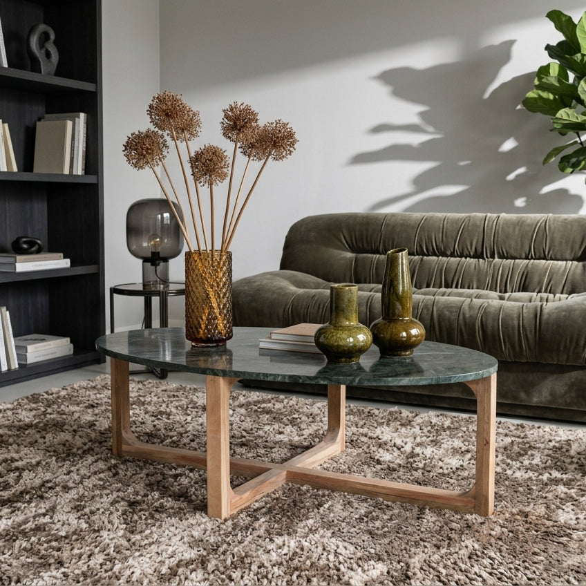 Kayu Living oval coffee table with a green marble top and sustainable mango-wood base in a modern living room