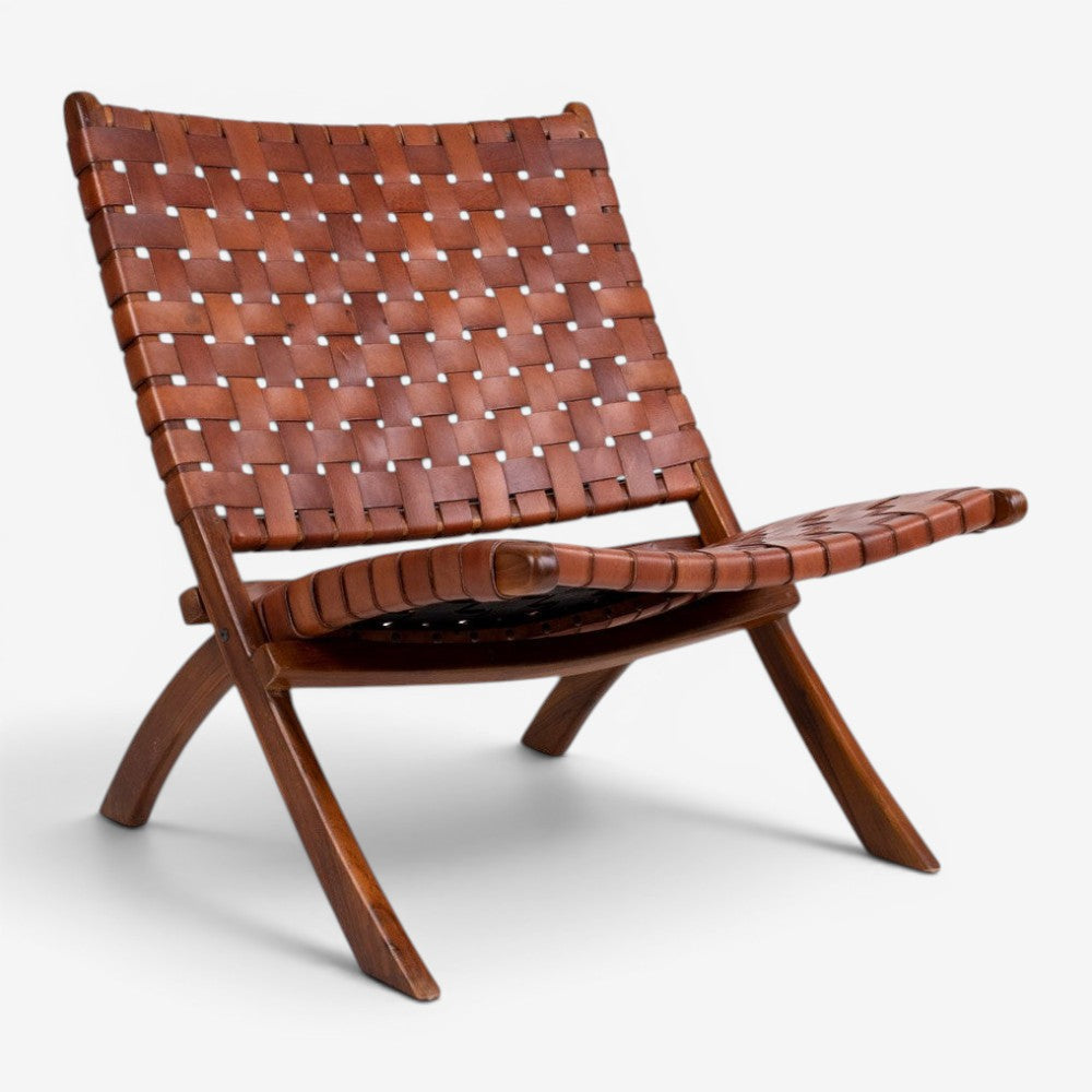 Kayu Living Perugia folding chair featuring a woven brown leather seat and backrest with sturdy teak wood legs.