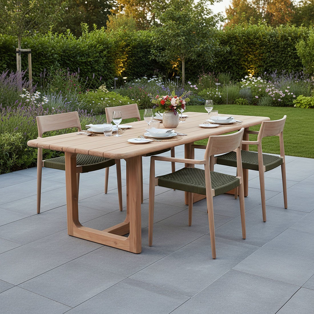 Kayu Living Primavera 200cm garden table in FSC recycled teak with rounded edges and U-shaped legs on a patio