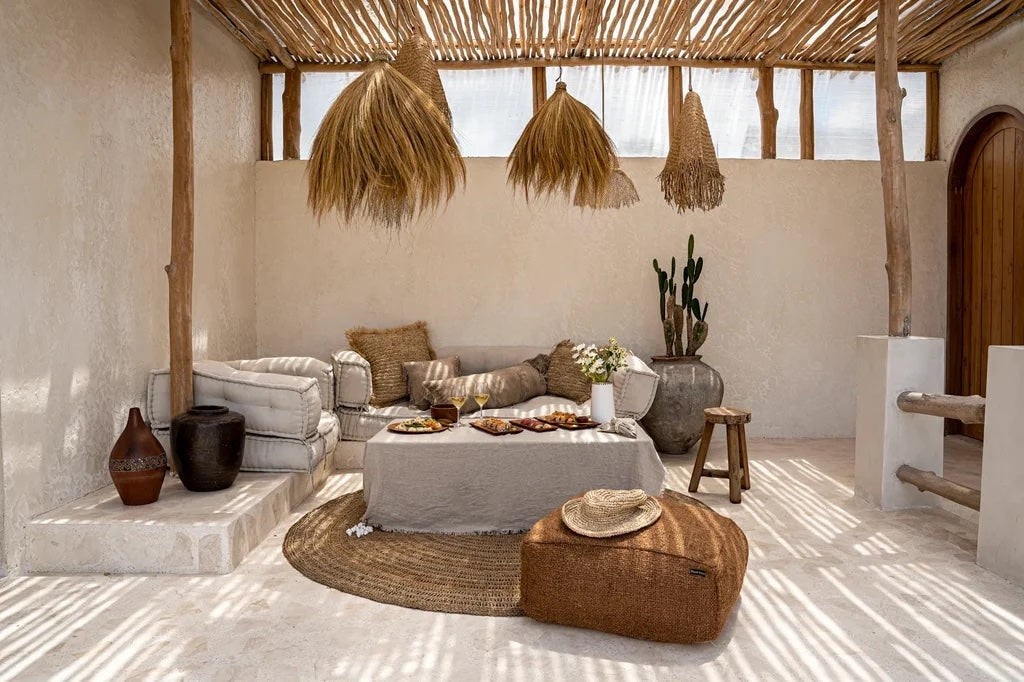 Kayu Living Rayung Pendant Lamp, a natural woven grass pendant light with a flowing silhouette, perfect for dining areas and living rooms.