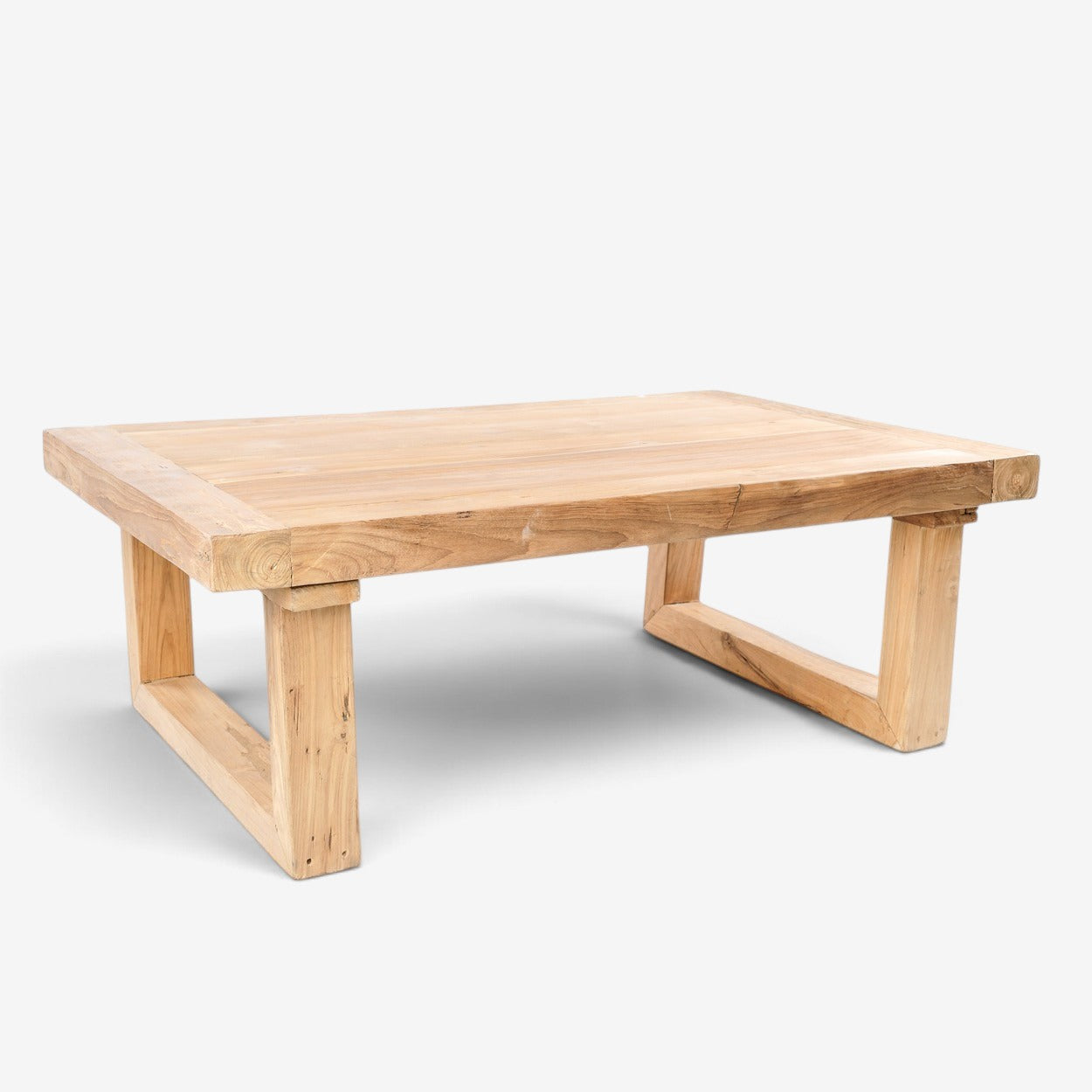 Kayu Living reclaimed teak coffee table with a natural wood finish and sturdy, minimalist block leg design.