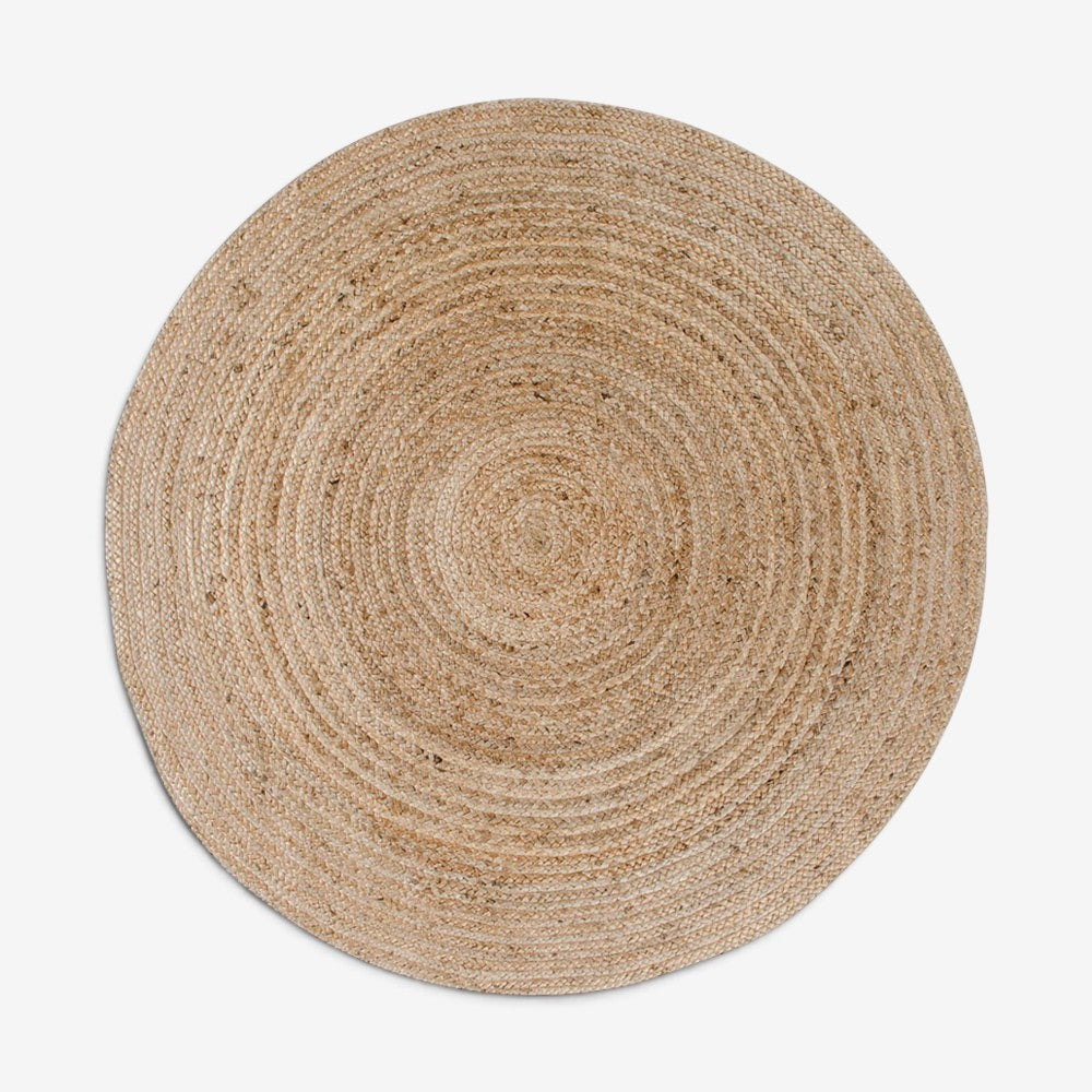 Kayu Living round braided jute rug in natural tan, 150 cm diameter, eco-friendly textured floor covering.