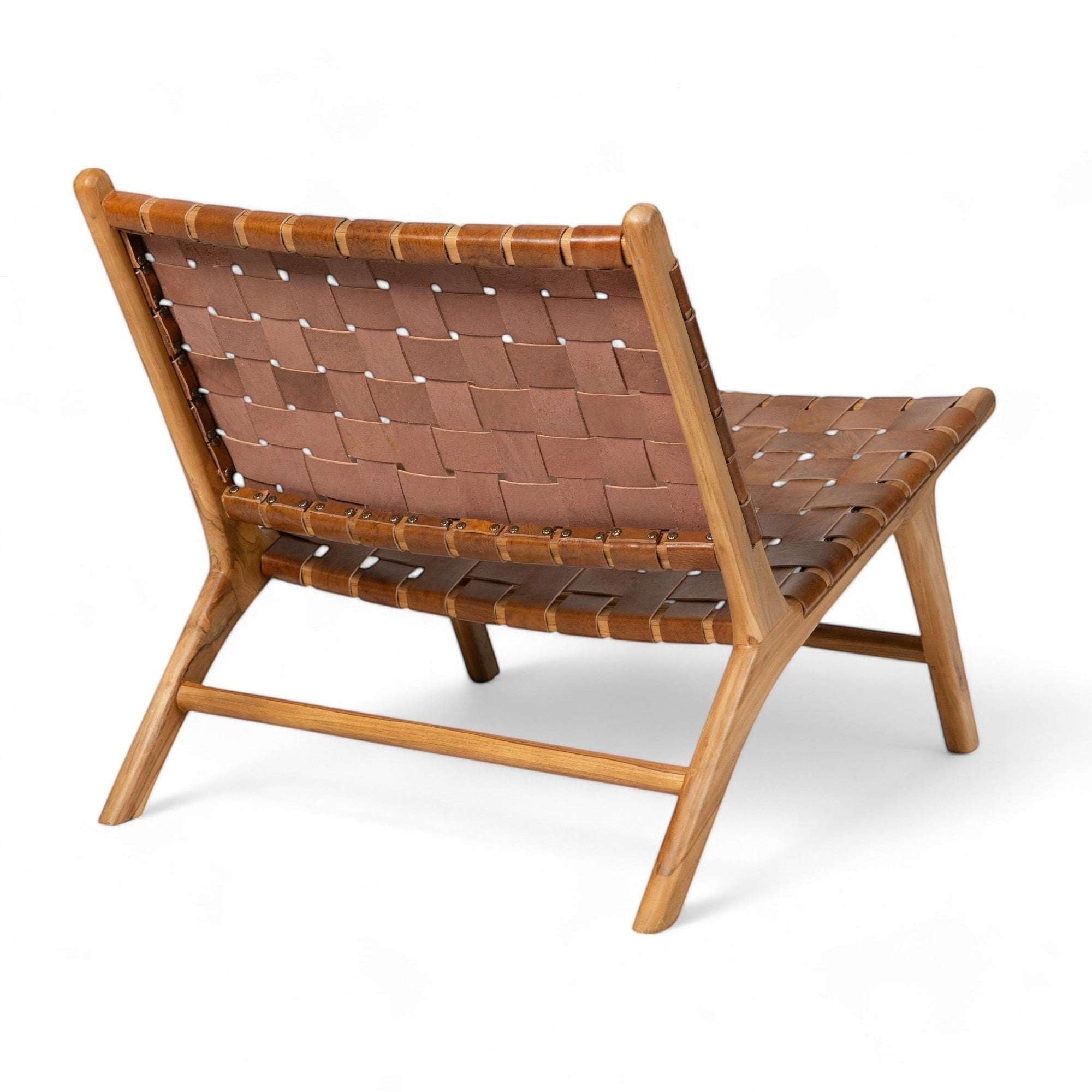 Kayu Living Sanur lounge chair with handwoven camel leather seat and teak frame. Modern design.