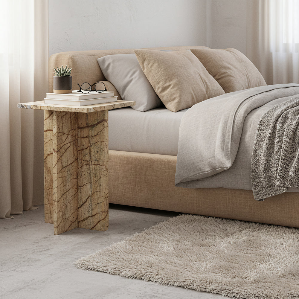 Kayu Living Seoel Bizar square marble side table with unique veining and cross base in a modern bedroom setting.
