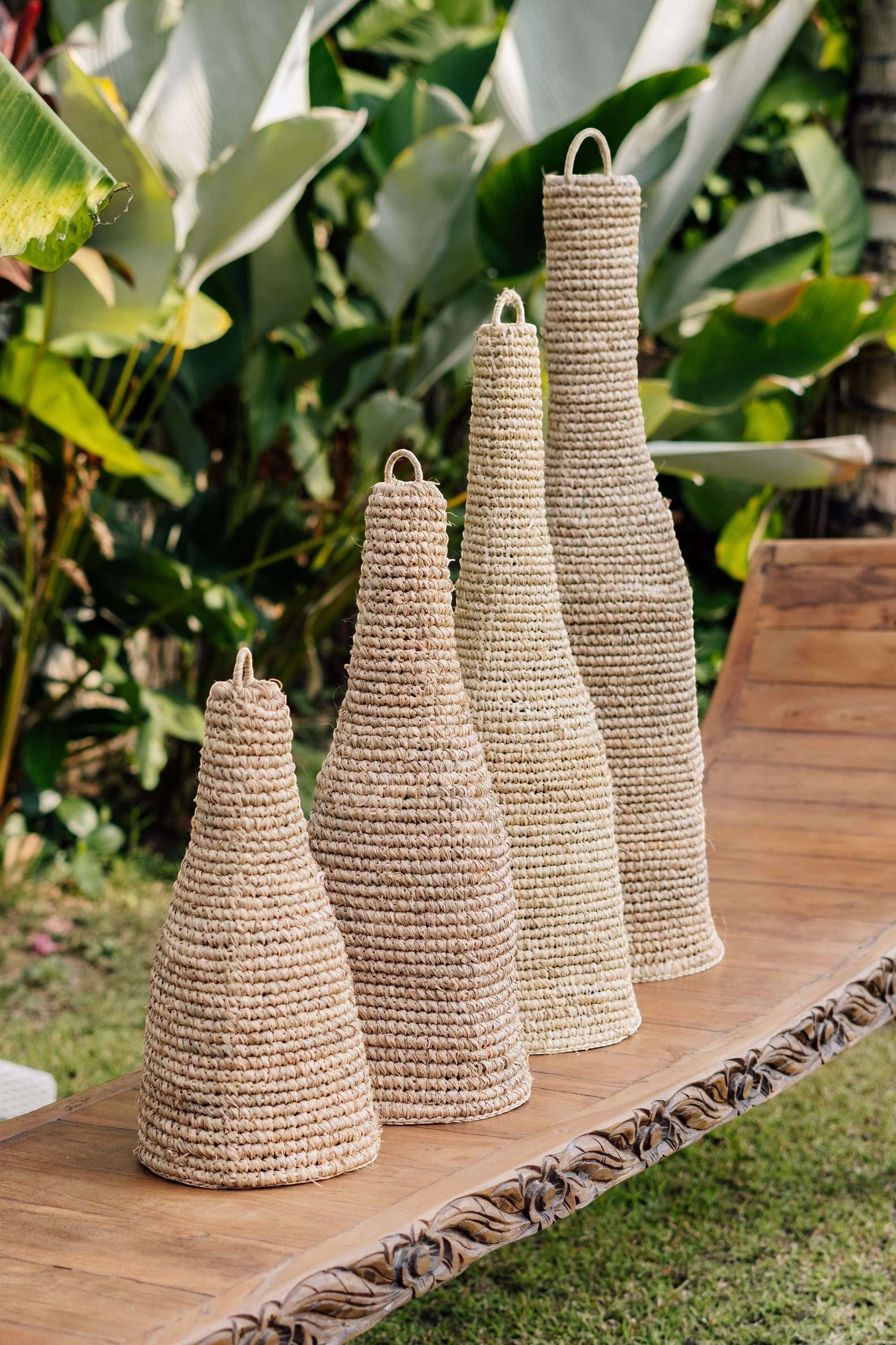 Kayu Living natural sisal pendant lampshade, wasp house design, available in multiple sizes, adds rustic elegance.