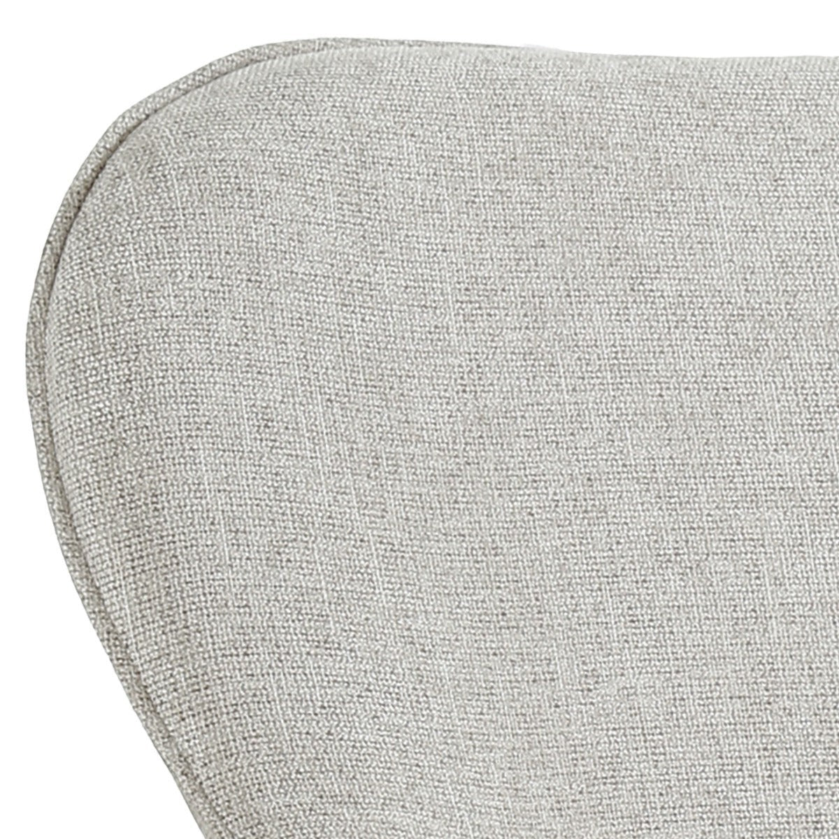 Close-up of the textured light beige fabric on a Kayu Living Sven Bisque Swivel Armchair