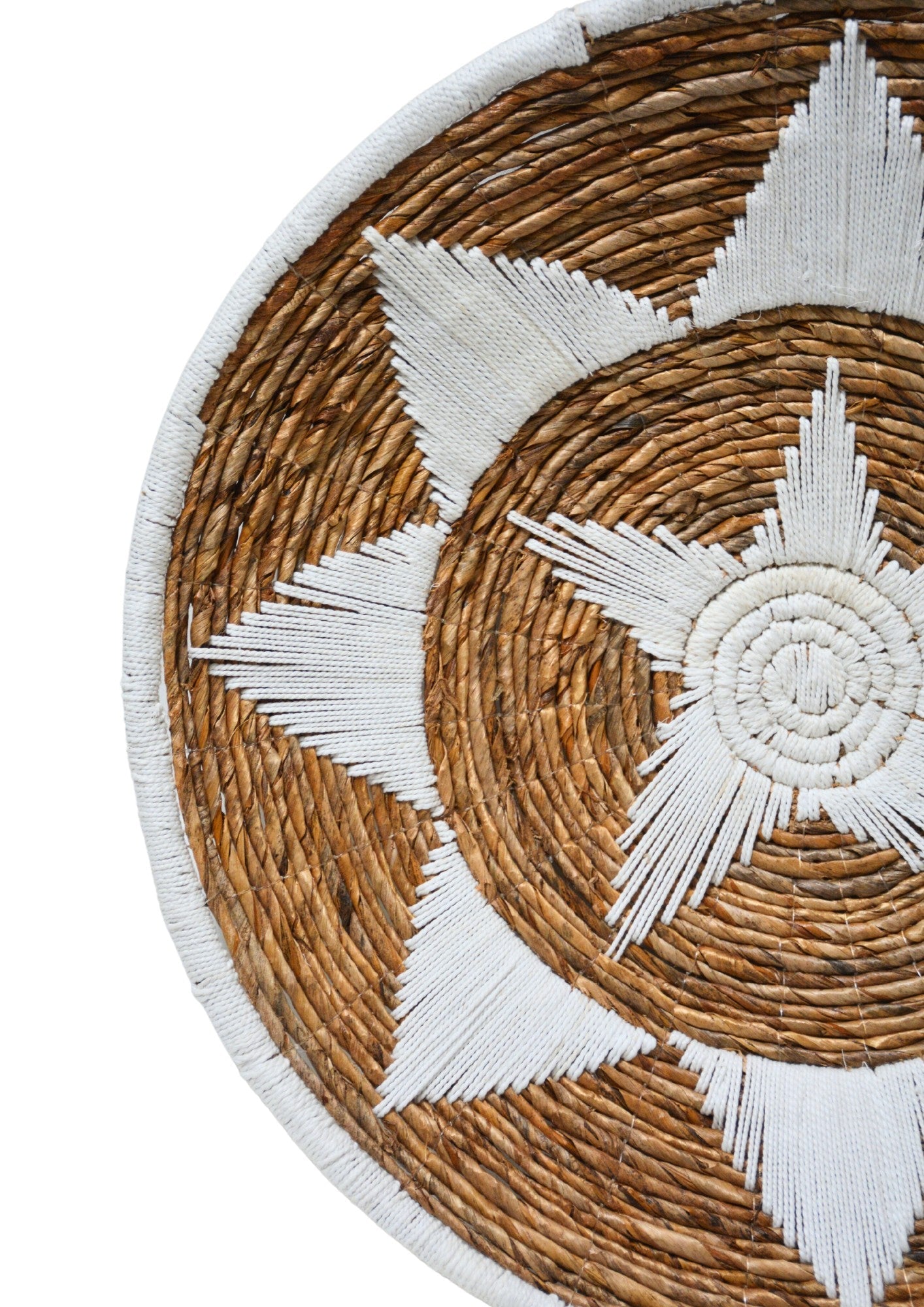 Kayu Living Uluwatu XL wall basket featuring a brown banana-leaf base with intricate white cotton star pattern.