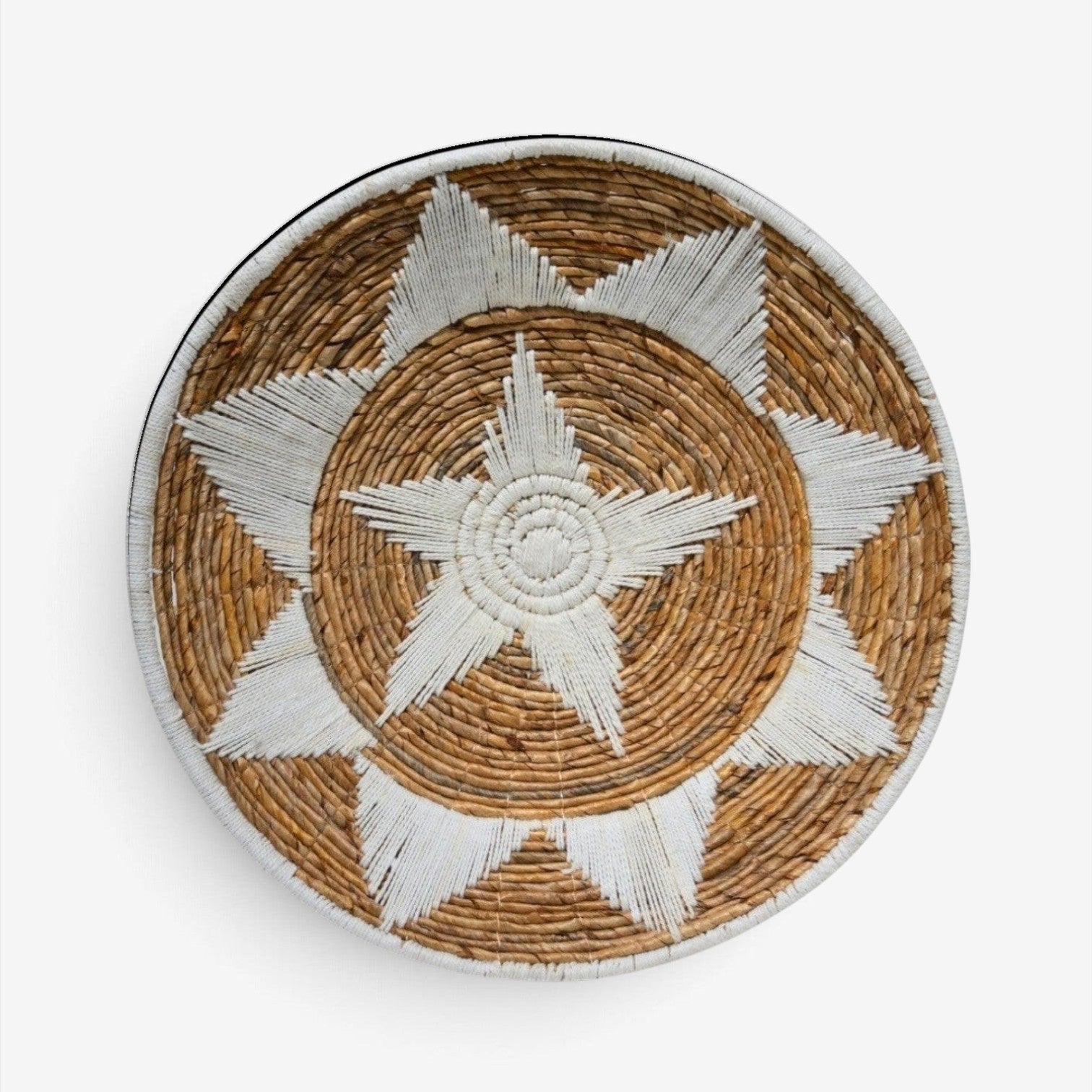 Kayu Living Uluwatu handmade banana-leaf and cotton wall basket in brown and white with a bohemian star pattern.
