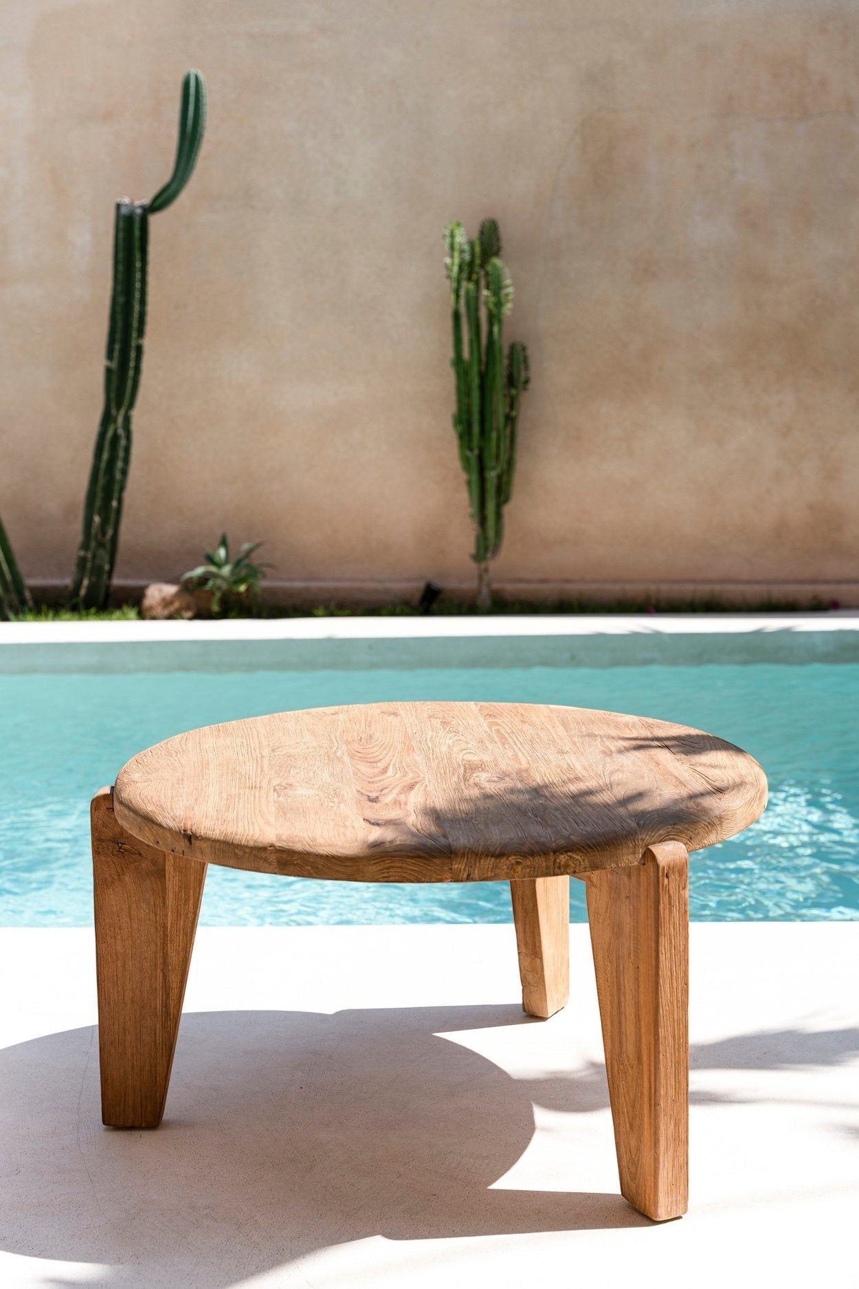 Kayu Living Wabi Sabi reclaimed teak coffee table with three legs and natural finish.