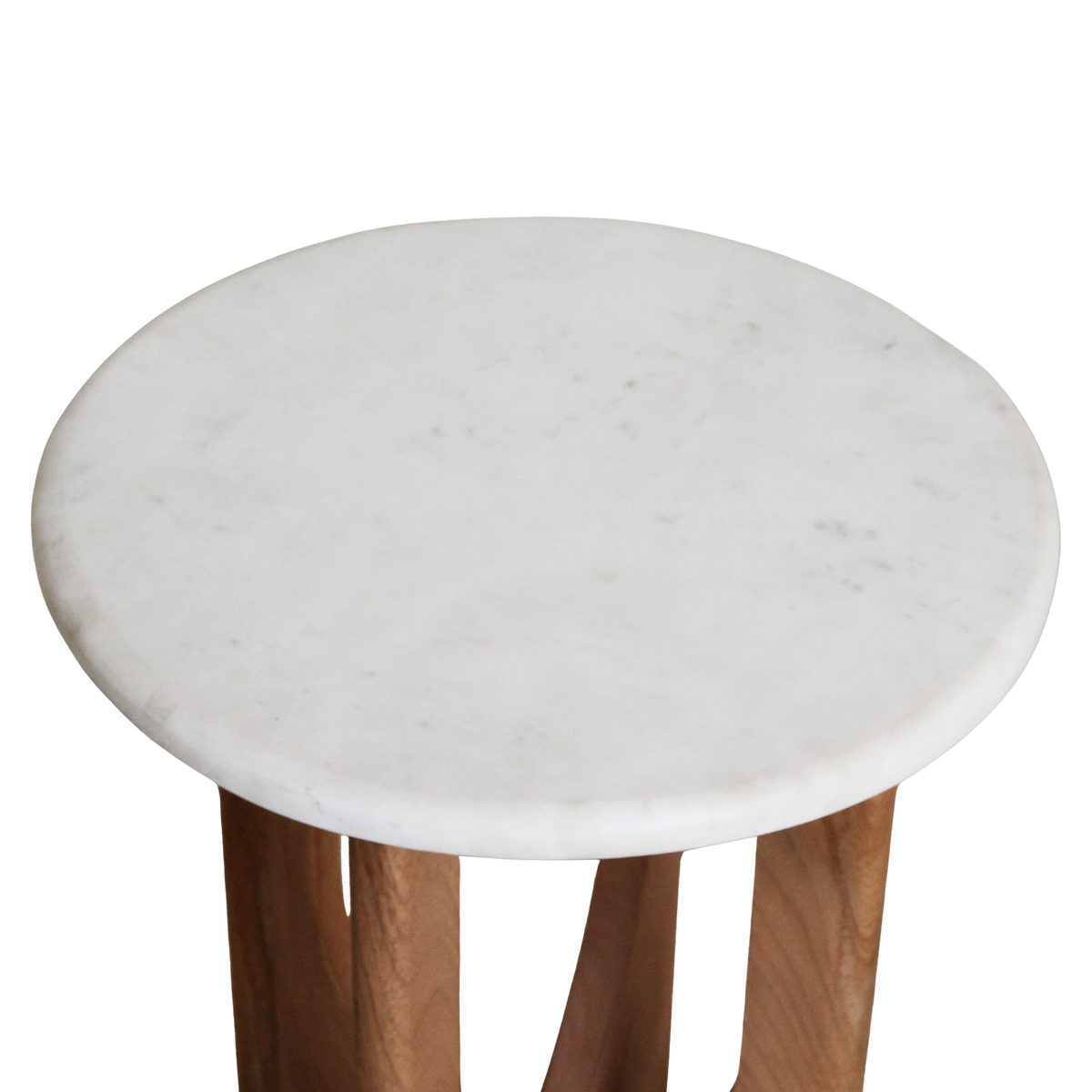 Kayu Living Kuching white marble side table with a round top and warm mango wood arched base against a black background