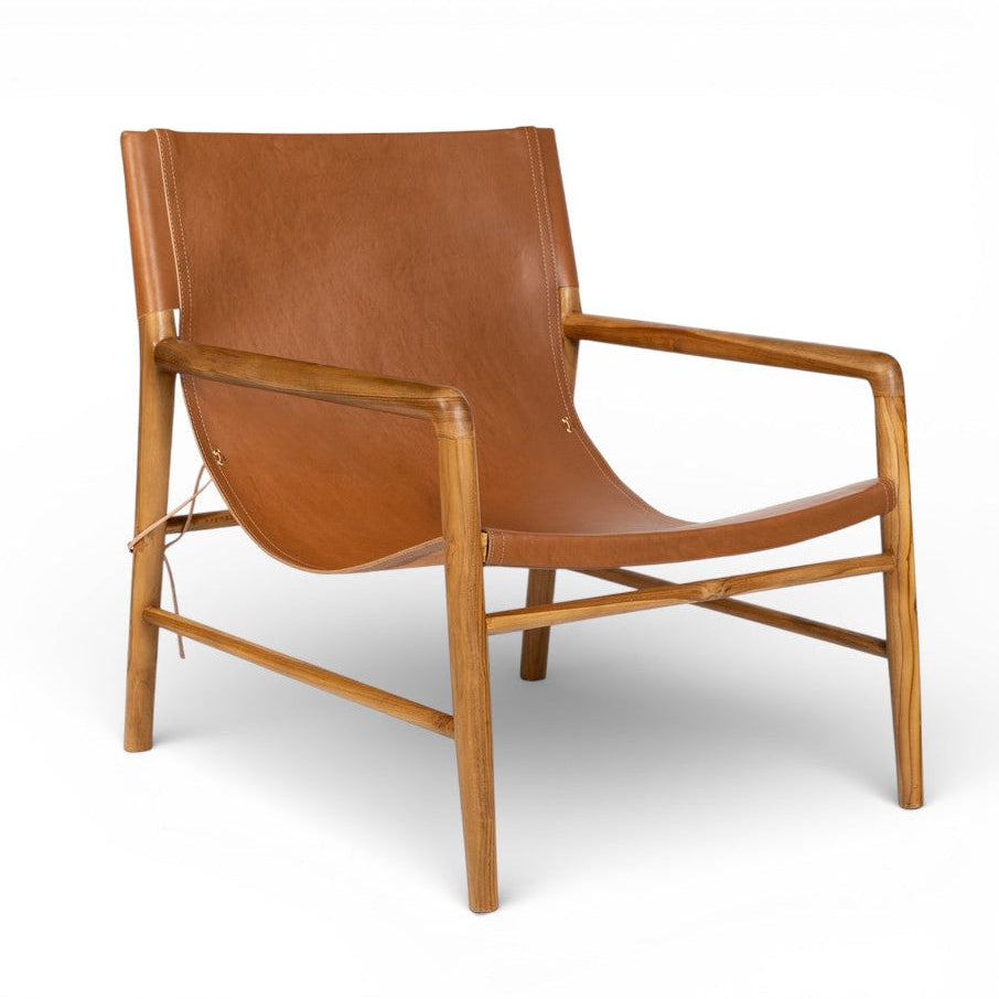 Brown leather armchair on a white background